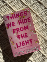 Load image into Gallery viewer, Book - Things We Hide From The Light by Lucy Score